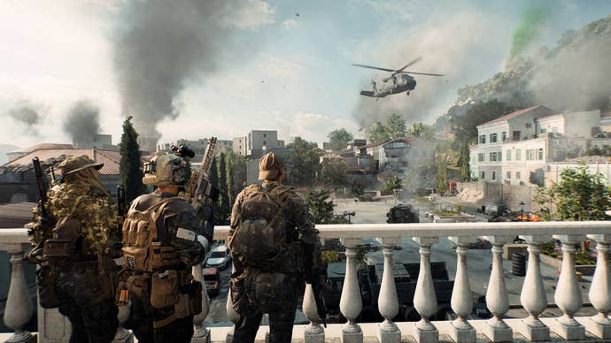 A screenshot of Battlefield 6, showing three soldiers stood on a balcony in Gibraltar, overlooking a square as a helicopter hovers overhead.