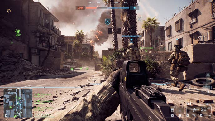 A screenshot of Battlefield 6, showing the player crouching to the side of a Cairo street lined with anti-tank mines.