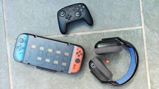 switch 2 accessories on a tile floor outside, including game storage, case, headset, microsd express memory card and controller