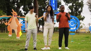 Pokemon Go community campsites trailer screenshot showing three humans on phone with pokemon behind them