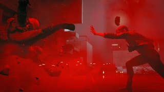 A screenshot from Control showing one character forcefully throwing another armoured soldier character into a wall. It looks like they've done it with telekentic powers. The image is hued in vibrant red.