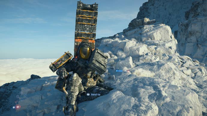 Sam clambers over rocks in Death Stranding 2.