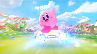 Kirby rides a star through a green land in Kirby Air Riders.