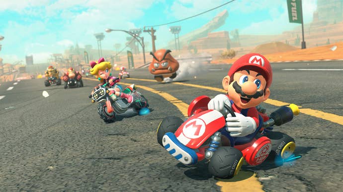 Super Mario and Princess Peach powersliding their karts during a race in the Switch 2 exclusive Mario Kart World.