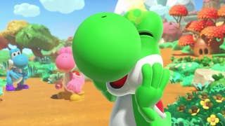 Close up of green Yoshi smiling in Yoshi and the Mysterious Book trailer
