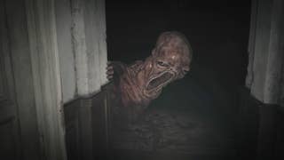 A huge, grotesque, disturbing baby monster flops around a dark hallway corner in Resident Evil Village.