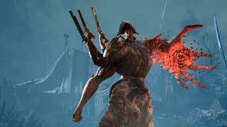 A giant enemy with three mutated hands holding guns and a massive red arm prepares to attack you.